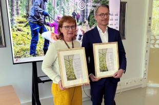 Paula Kankaanmäki LadyForestista ja Versowoodin toimitusjohtaja Ville Kopra. 